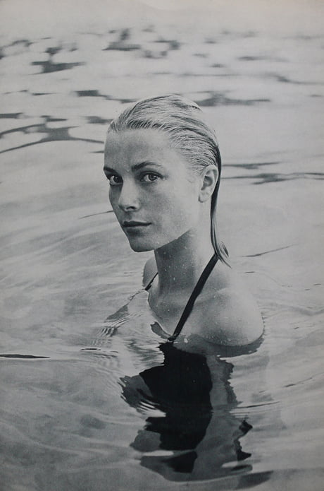 Elegant style icon wardrobe essentials: Grace Kelly in swimwear, a halter neck one piece swimming suit, Jamaica, 1955