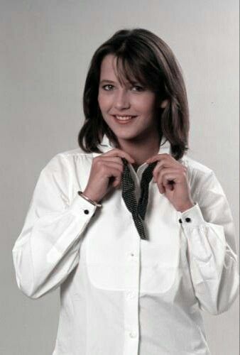 Elegant style icon wardrobe essentials: Sophie Marceau in white shirt