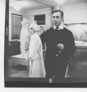Charles James works with dress form, 1950