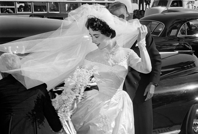 Elizabeth Taylor on her wedding day, wearing wedding gown designed by Helen Rose, May 6, 1950