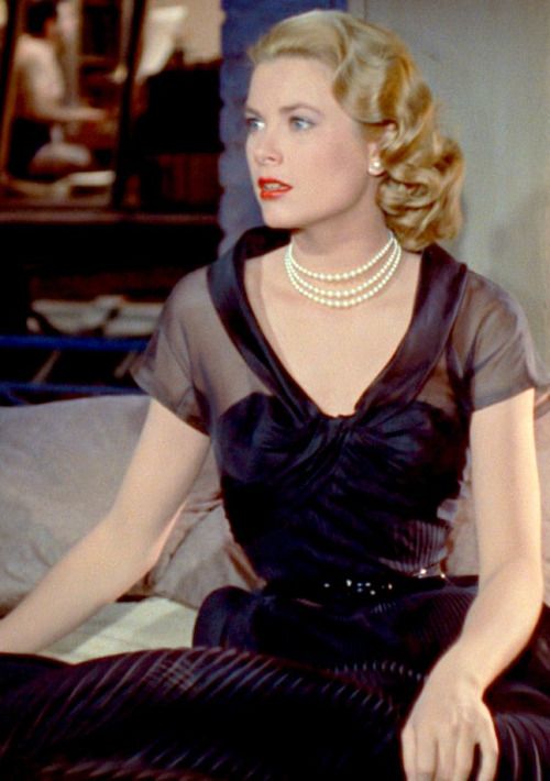 Elegant style icon wardrobe essentials: Grace Kelly in black dress, film Rear Window(1954)