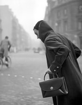 Sophie Malgat Litvak in Jacques Fath Coat, photo by George Dambier for ELLE, 1953