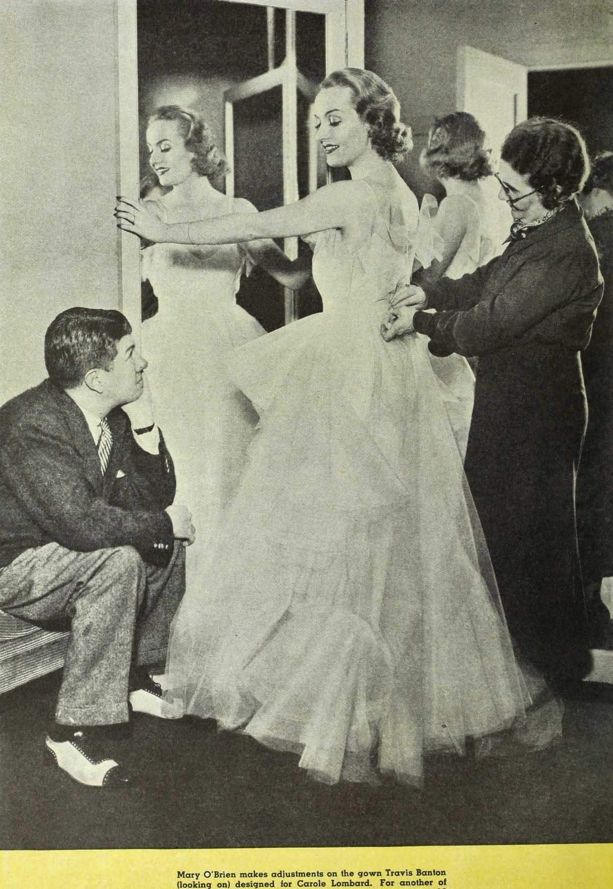 Travis Banton working with Carole Lombard
