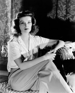 Elegant style icon wardrobe essentials: Kathrine Hepburn in white shirt