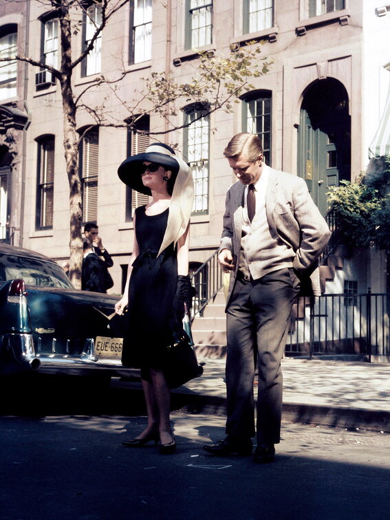 Audrey Hepburn movie costume in film Breakfast at Tiffany's(1961), the complete wardrobe of Holly Golightly:Black sleeveless knee length dress with tie belt and hem fringes