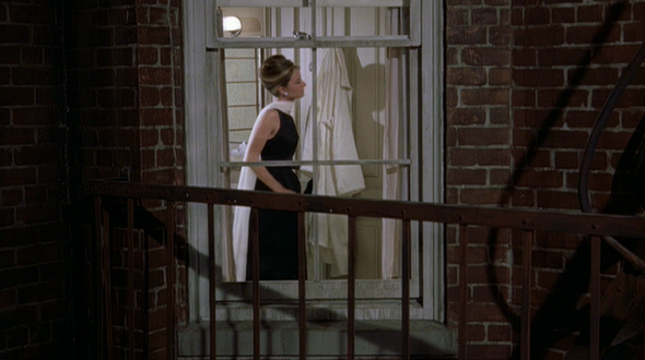 Audrey Hepburn movie costume in film Breakfast at Tiffany's(1961), the complete wardrobe of Holly Golightly:Black floor length sleeveless dress with moonlike back cut-out
