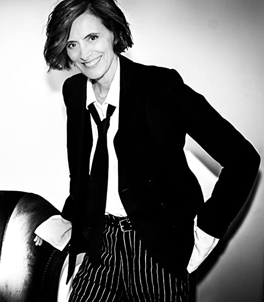 Elegant icon wardrobe essentials: Inès de La Fressange in white shirt