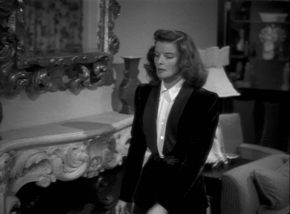 Elegant style icon wardrobe essentials: Kathrine Hepburn in white shirt