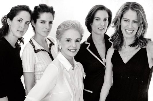 Elegant style icon wardrobe essentials: Carolina Herrera in white shirt