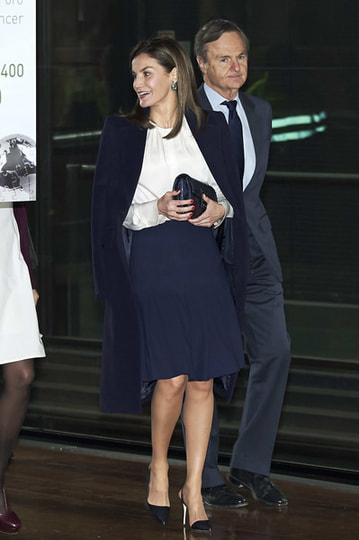 Elegant style icon wardrobe essentials: Queen Letizia of Spain in white shirt