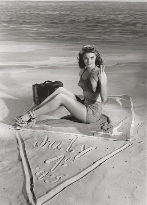 Elegant style icon wardrobe essentials: Ava Gardner in swimwear, a two piece bikini in solid color