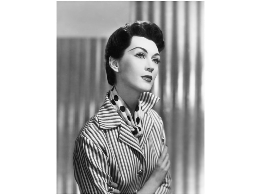 Elegant style icon wardrobe essentials: The Polka dot: Dovima in polka dot silk scarf