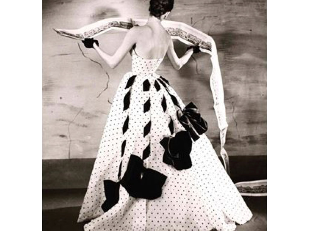 Elegant style icon wardrobe essentials: The Polka dot, Suzy Parker in a Jacques Fath silk polka dot gown. Panorama of Paris, 1953