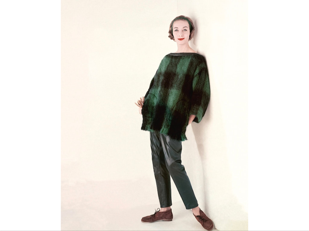 Model in a plaid sweater and leather pants by Bonnie Cashin and shoes by Fortunet glam  Glamour, August 1958 © Frances McLaughlin-Gill