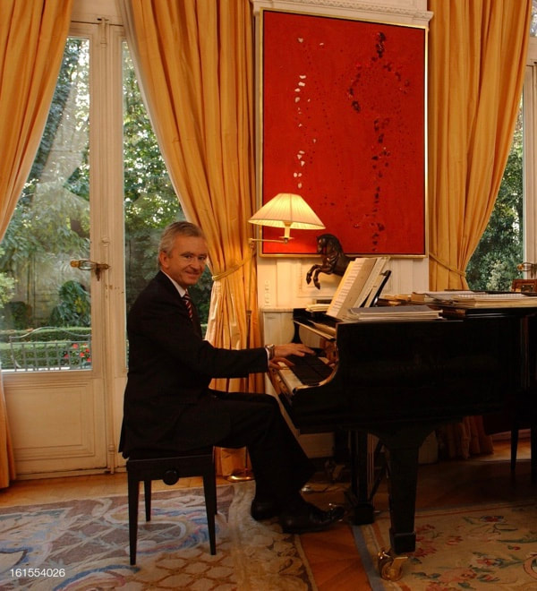 Bernard Arnault playing piano at home in Paris