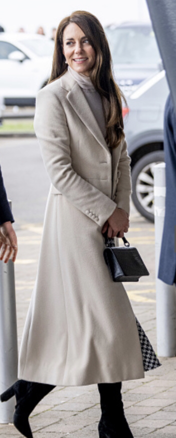 Kate Middleton in custom made cream Chris Kerr wool coat, 28 Feb 2023. Getty Images