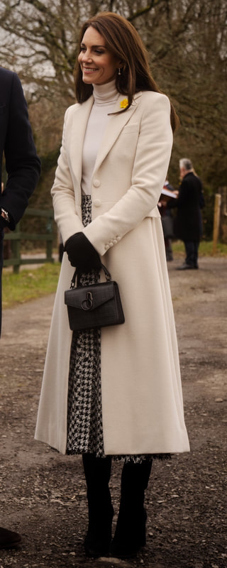 Kate Middleton in custom made cream Chris Kerr wool coat, 28 Feb 2023. Getty Images