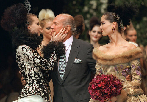 ​Óscar Arístides Renta Fiallo (22 July 1932 – 20 October 2014) with his models