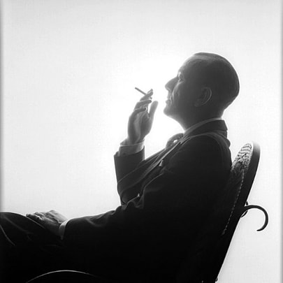 Noel Coward smoking