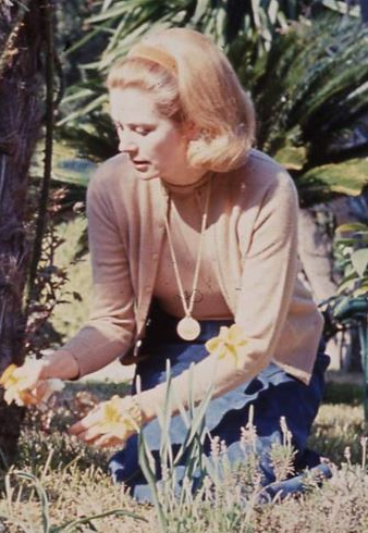 Elegant style icon wardrobe essentials: Grace Kelly in cardigan sweater