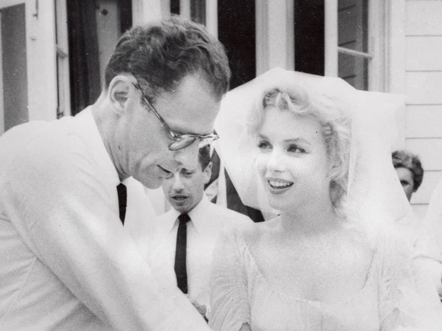 Marilyn Monroe with Arthur Miller on their wedding day, 1956