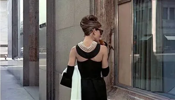 Back view of Audrey Hepburn in the black Givenchy dress at Tiffany's window, Breakfast at Tiffany's (film, 1961)