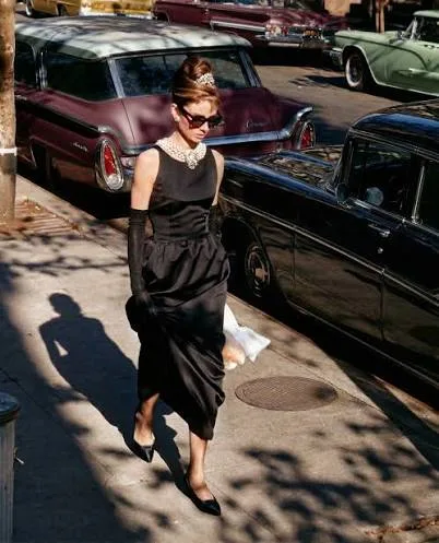 Audrey Hepburn movie costume Breakfast at Tiffany black floor length sheath dress with back cutout of silk satin…