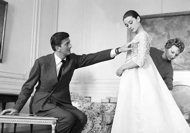 Audrey Hepburn at a fitting with Hubert de Givenchy