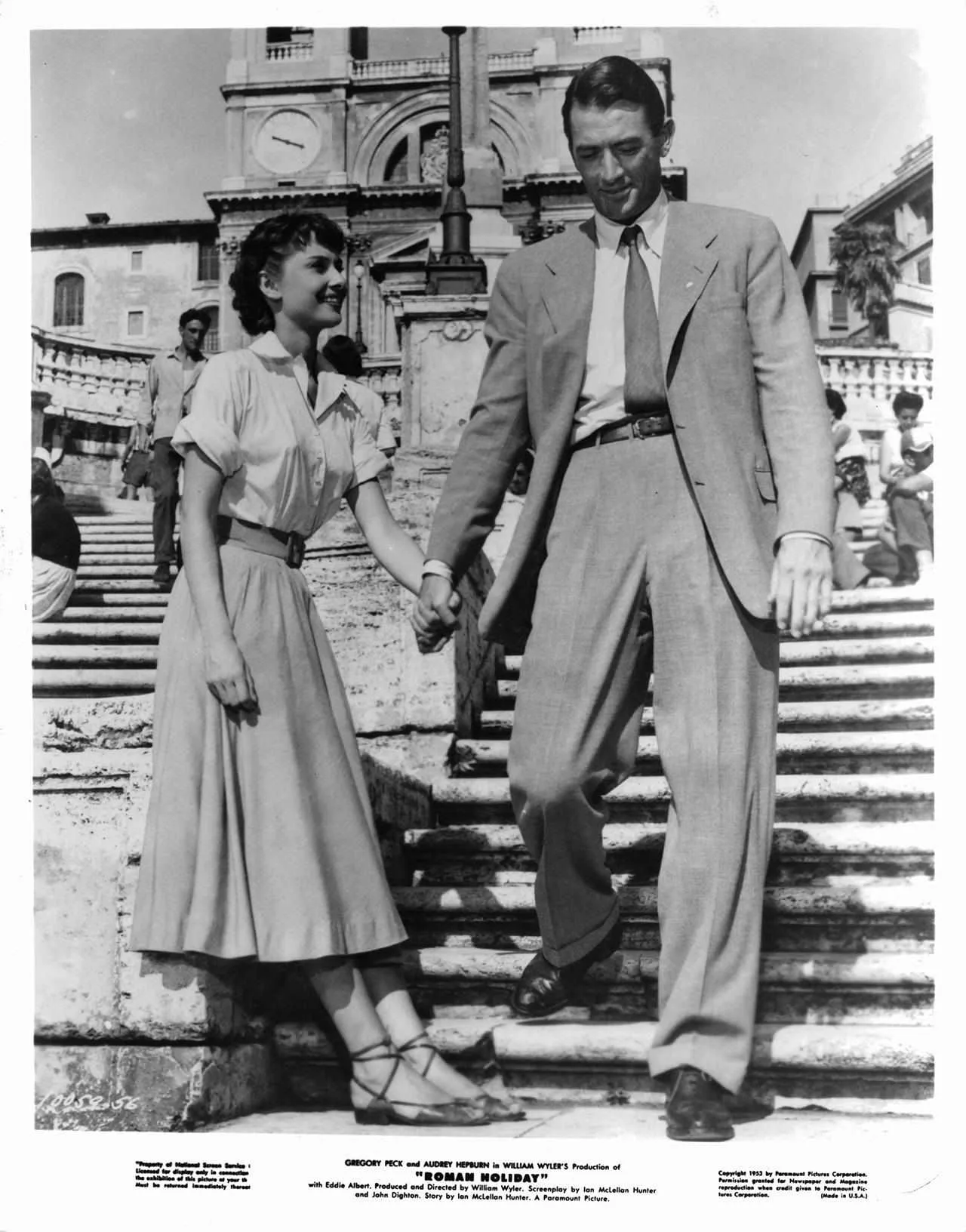 Audrey Hepburn in a white shirt and circle skirt with Gregory Peck on the Spanish Steps, Roman Holiday (film, 1953)