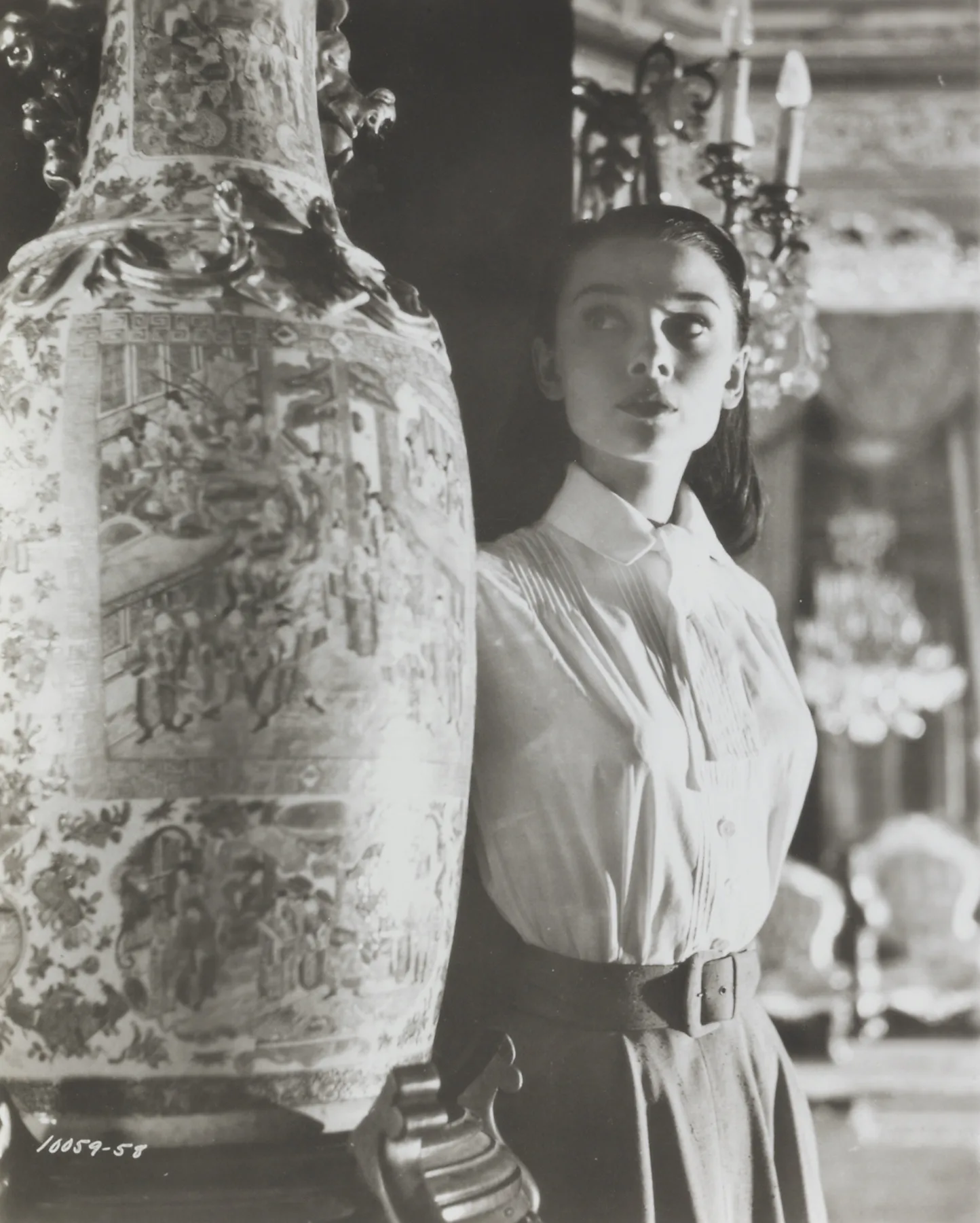 Audrey Hepburn in a white shirt, belt and long circle skirt, publicity photo for Roman Holiday (film, 1953)