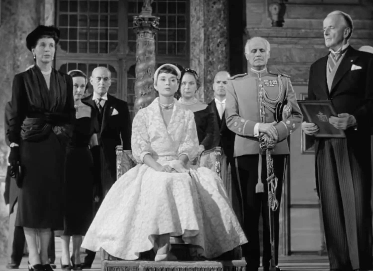 Audrey Hepburn in an ivory lace dress at the press conference, Roman Holiday (film, 1953)