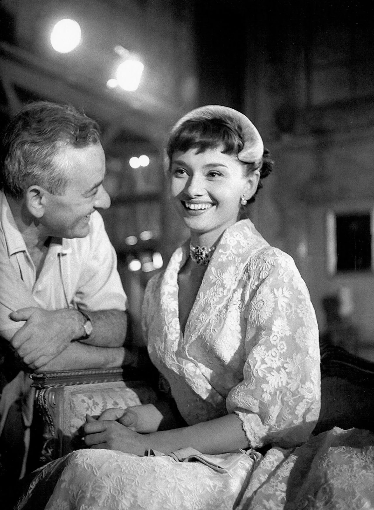 Audrey Hepburn in the lace dress with William Wyler on the set of Roman Holiday