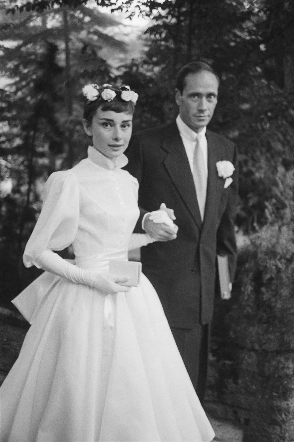 Audrey Hepburn in her Pierre Balmain wedding dress and flower crown with Mel Ferrer, Bürgenstock, 1954