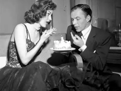 Ava Gardner and Frank Sinatra at a table