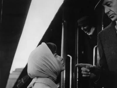 Audrey Hepburn wearing headscarf in film Love in the Afternoon(1957)