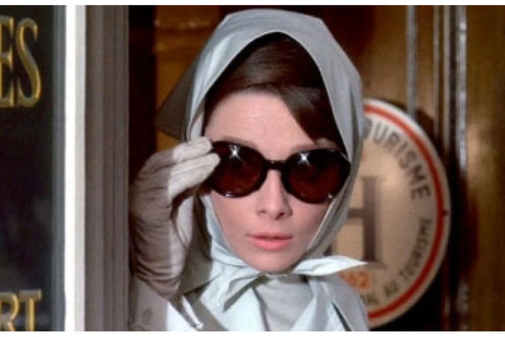 Audrey Hepburn wearing headscarf in film Charade(1963)