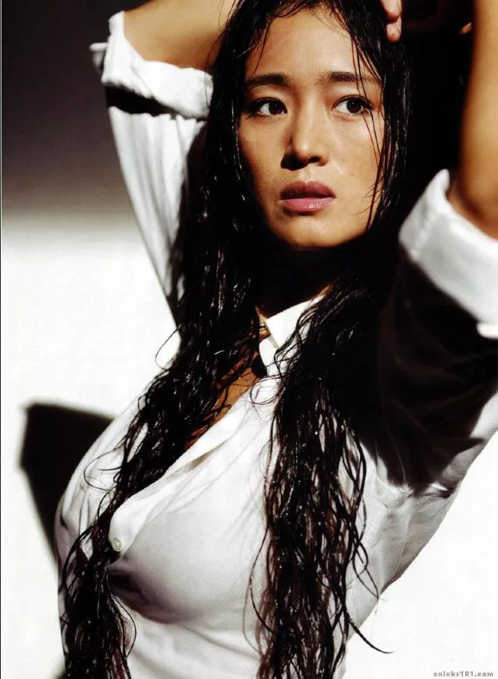 Gong Li in a white shirt with long loose hair, portrait