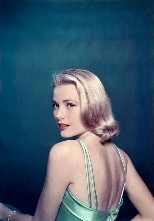 Grace Kelly from the back, showing the double straps of her ice-blue satin gown