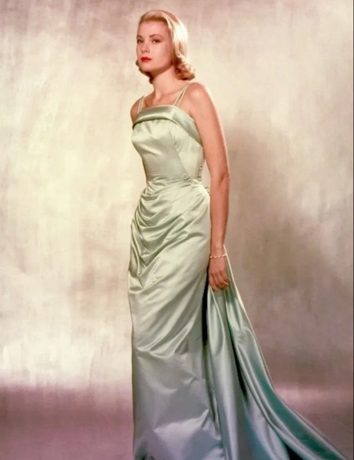 Grace Kelly in her ice-blue satin gown and long train