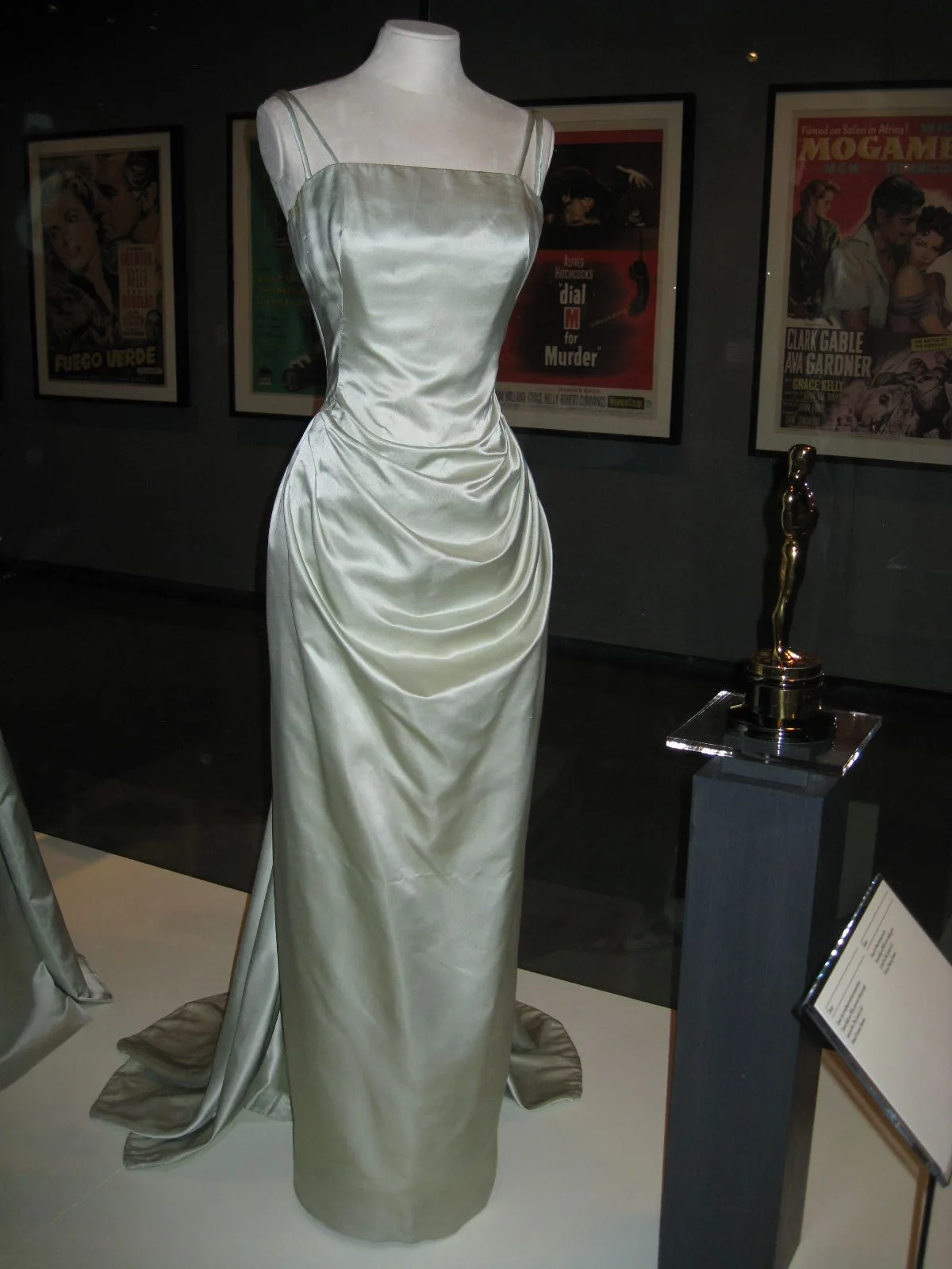 Grace Kelly's ice-blue satin Oscar gown on display with her Oscar statuette