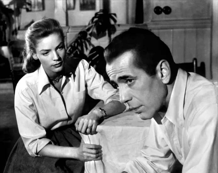 Humphrey Bogart, Lauren Bacall and a co-star on the set of Key Largo, 1948