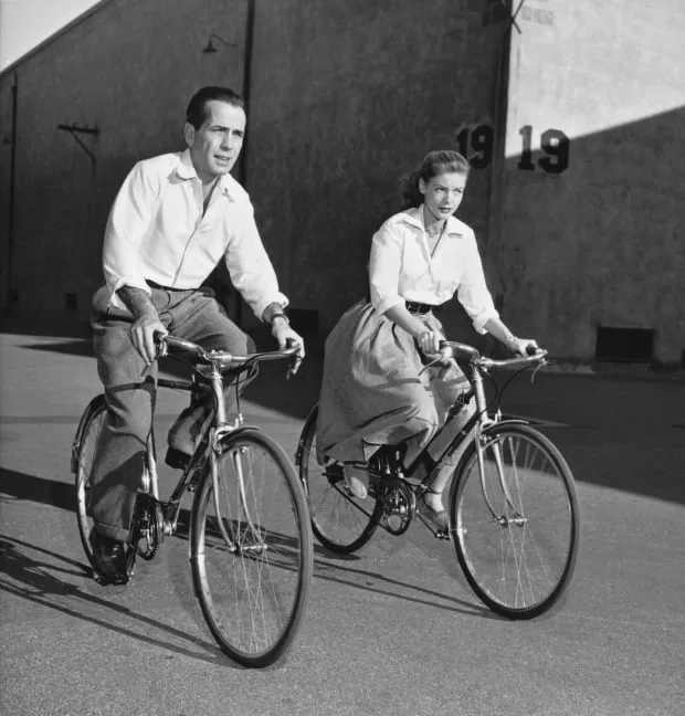 Lauren Bacall and Humphrey Bogart, both in white shirts, Key Largo (film, 1948)