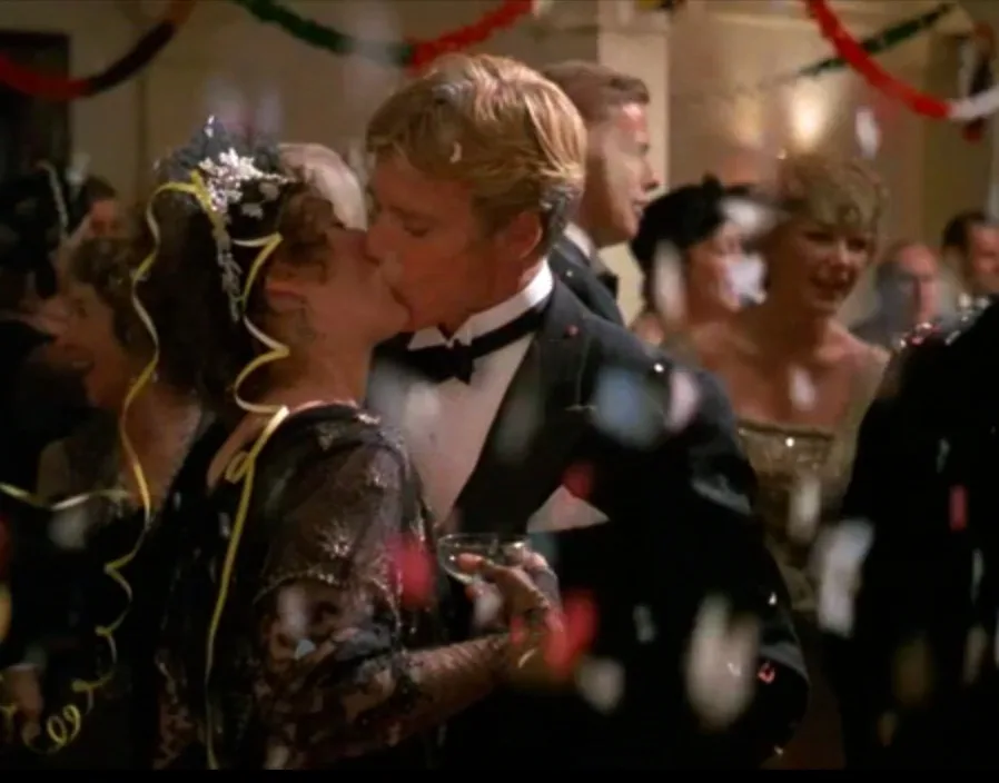 Meryl Streep as Karen Blixen and Robert Redford as Denys Finch Hatton kiss in film Out of Africa (1985)