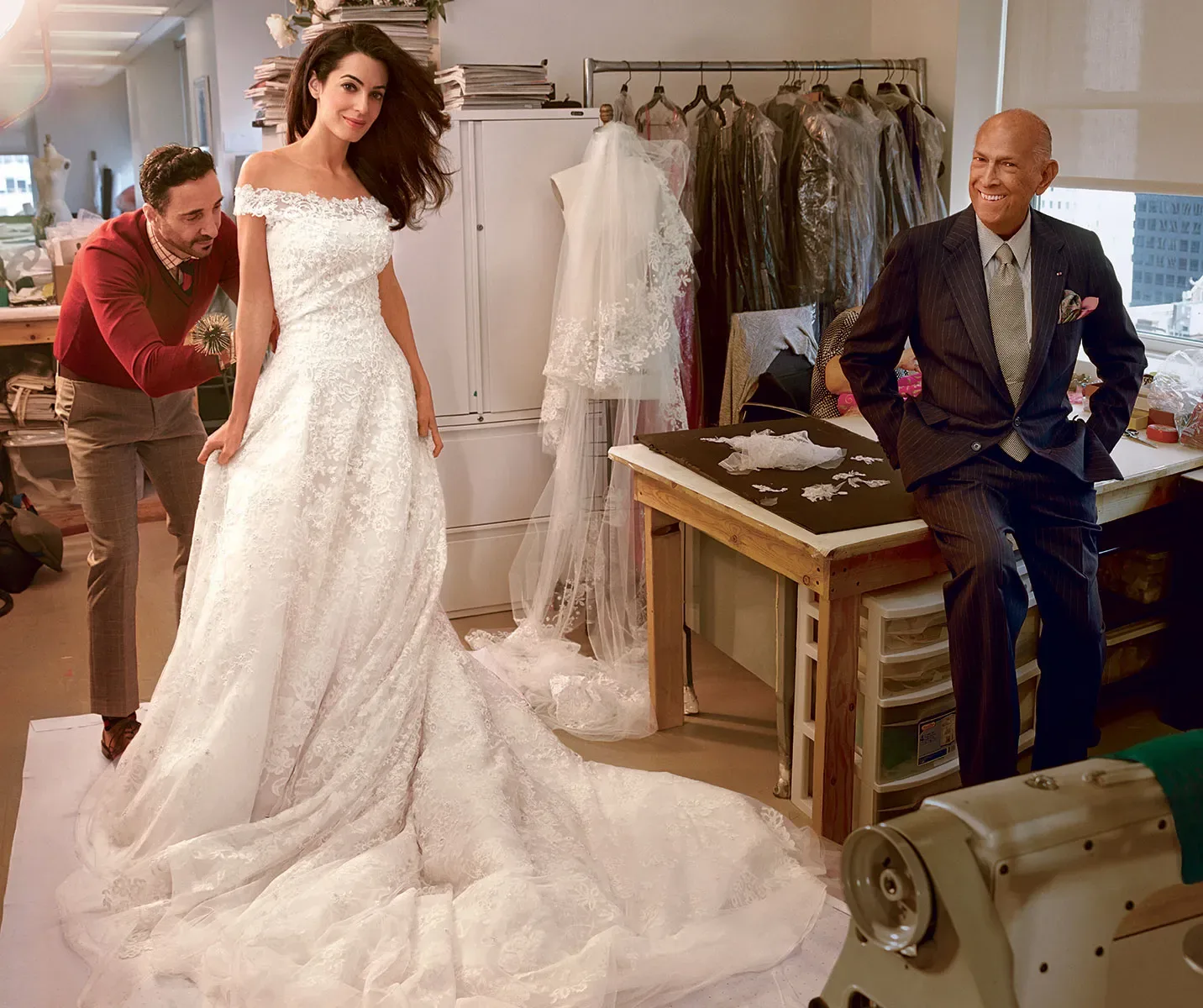 Alma Clooney with Oscar de la Renta, designer of her wedding dress