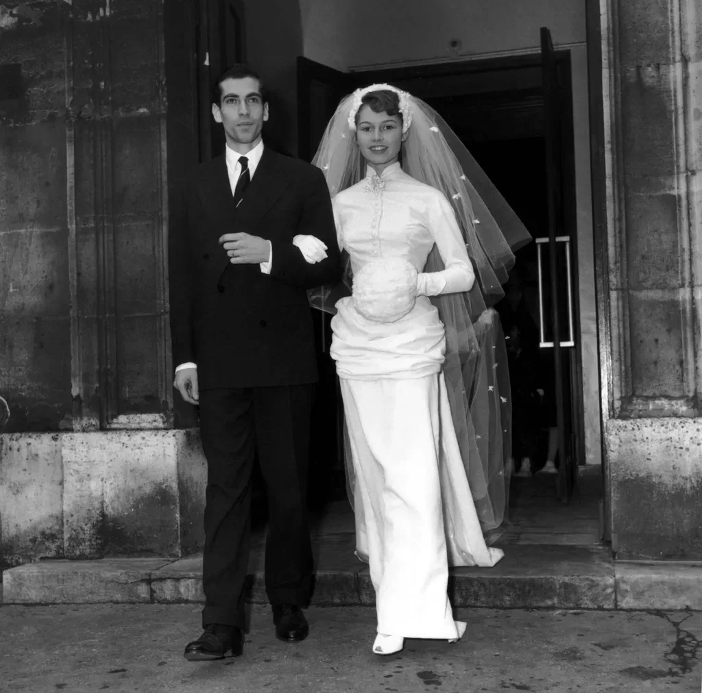 Brigitte Bardot with her first husband Roger Vadim on their wedding, 1952
