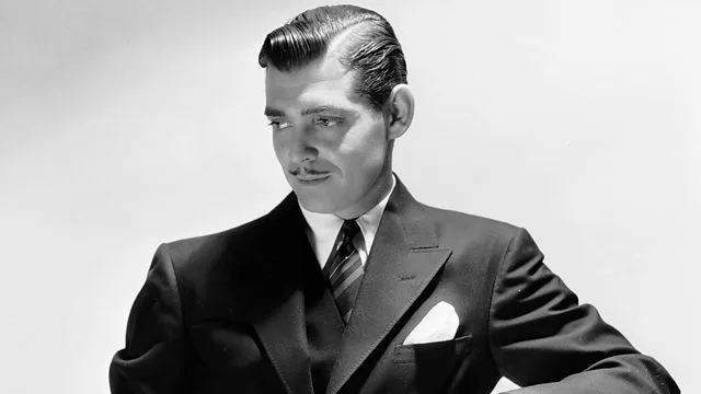 Clark Gable in a double-breasted suit, a signature of his tailored style