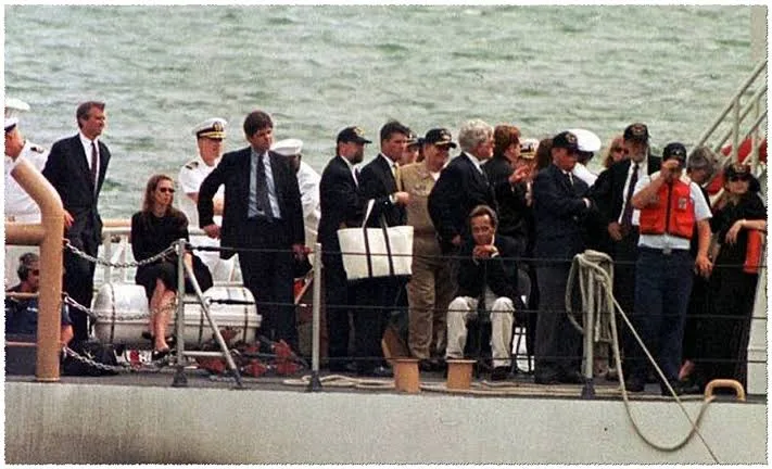 The Kennedy and Bessette families aboard the Coast Guard vessel Hammerhead, after the burial at sea of John F. Kennedy Jr., Carolyn Bessette Kennedy, and Lauren Bessette. 22 July 1999