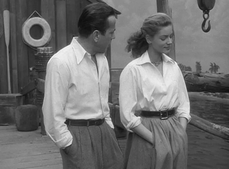 Lauren Bacall in her white shirt with Humphrey Bogart in Key Largo (1948), directed by John Huston