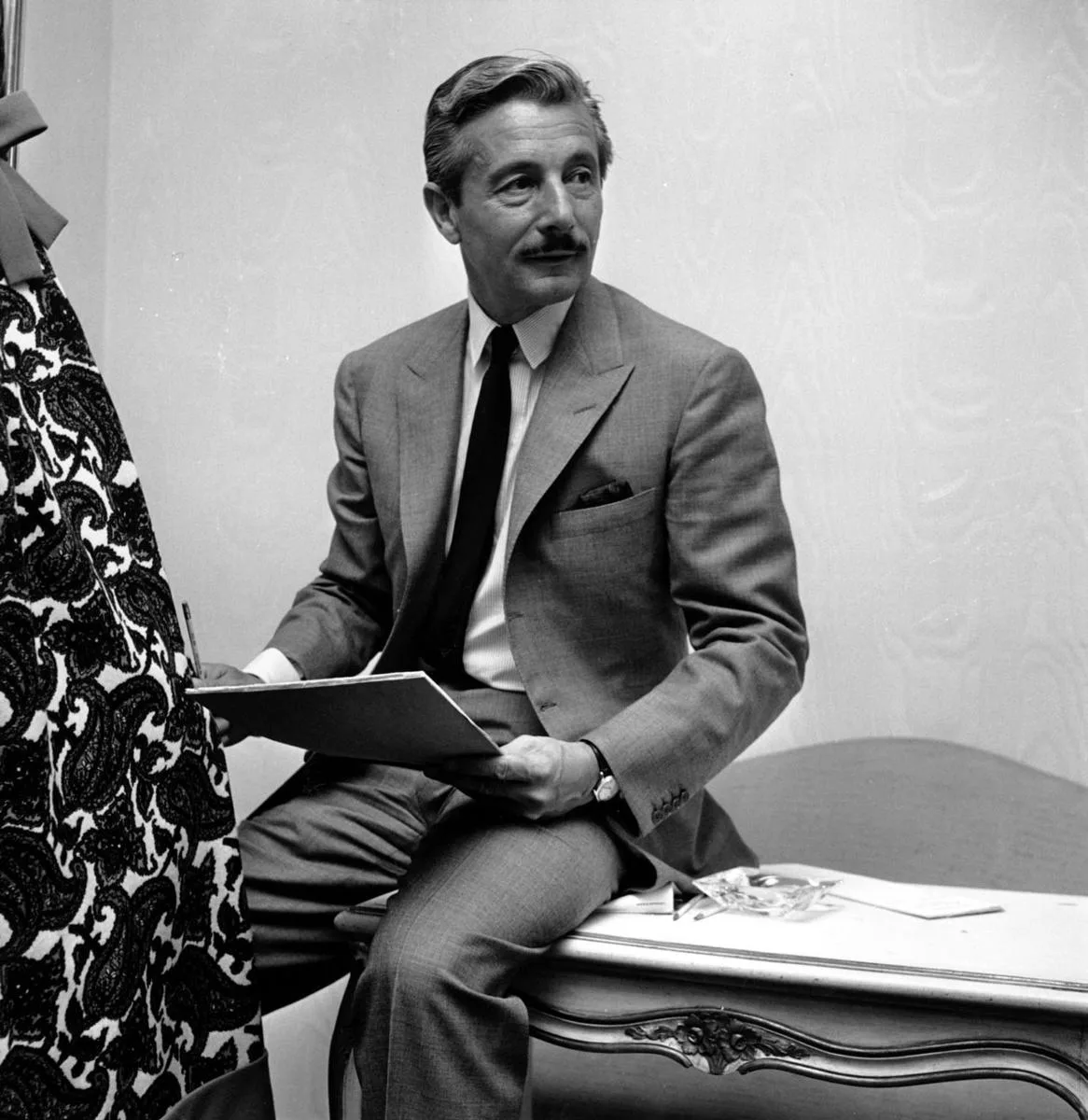 Oleg Cassini (born Oleg Aleksandrovich Loiewski; 11 April 1913 – 17 March 2006) was a French-born American fashion and costume designer whose career extended across Hollywood in Los Angeles, Seventh Avenue in New York, the White House in Washington, D.C