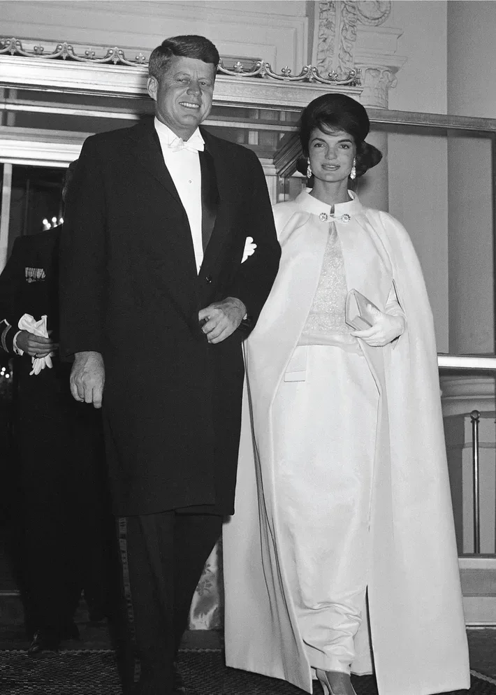 Jacqueline Kennedy in an ivory evening gown the inaugural celebrations in January 1961 designed by Oleg Cassini